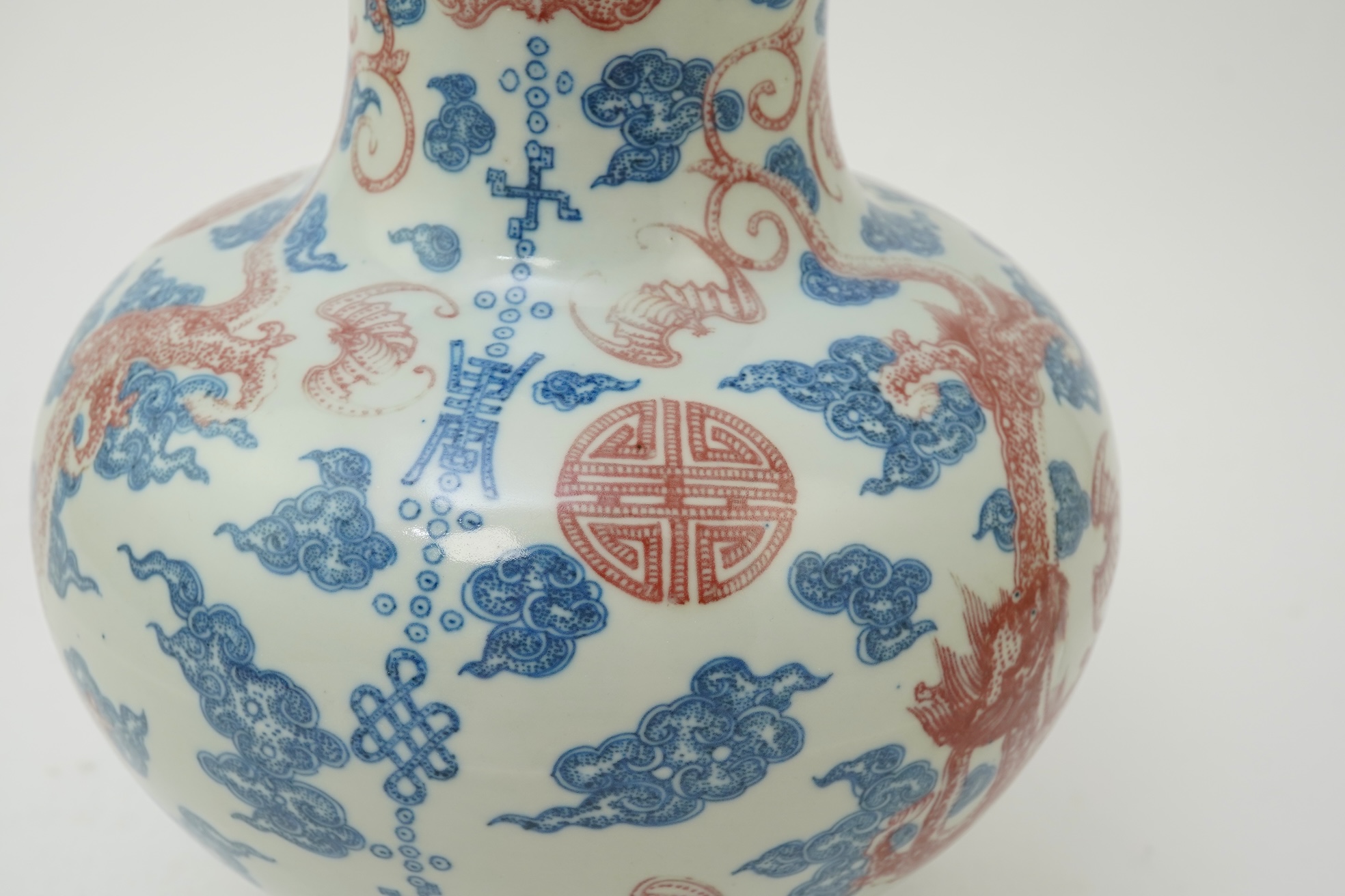 A Chinese underglaze blue and copper red ‘dragon’ vase, Qianlong seal mark but early 20th century